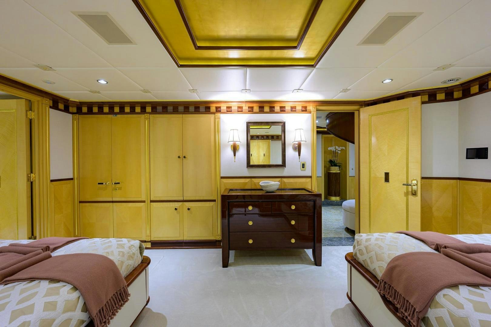 a room with wooden cabinets aboard STARSHIP Yacht for Sale