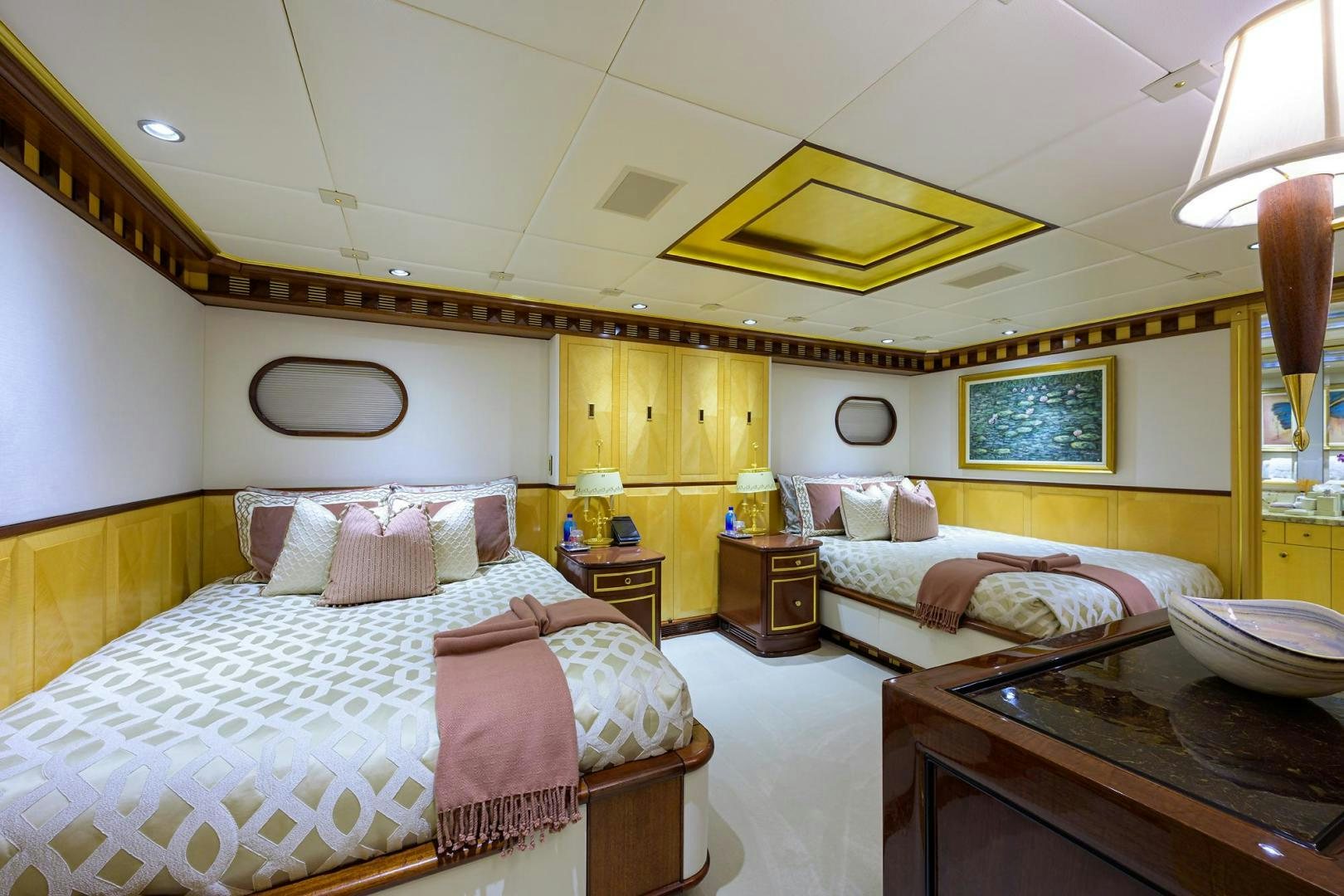 a room with two beds aboard STARSHIP Yacht for Sale