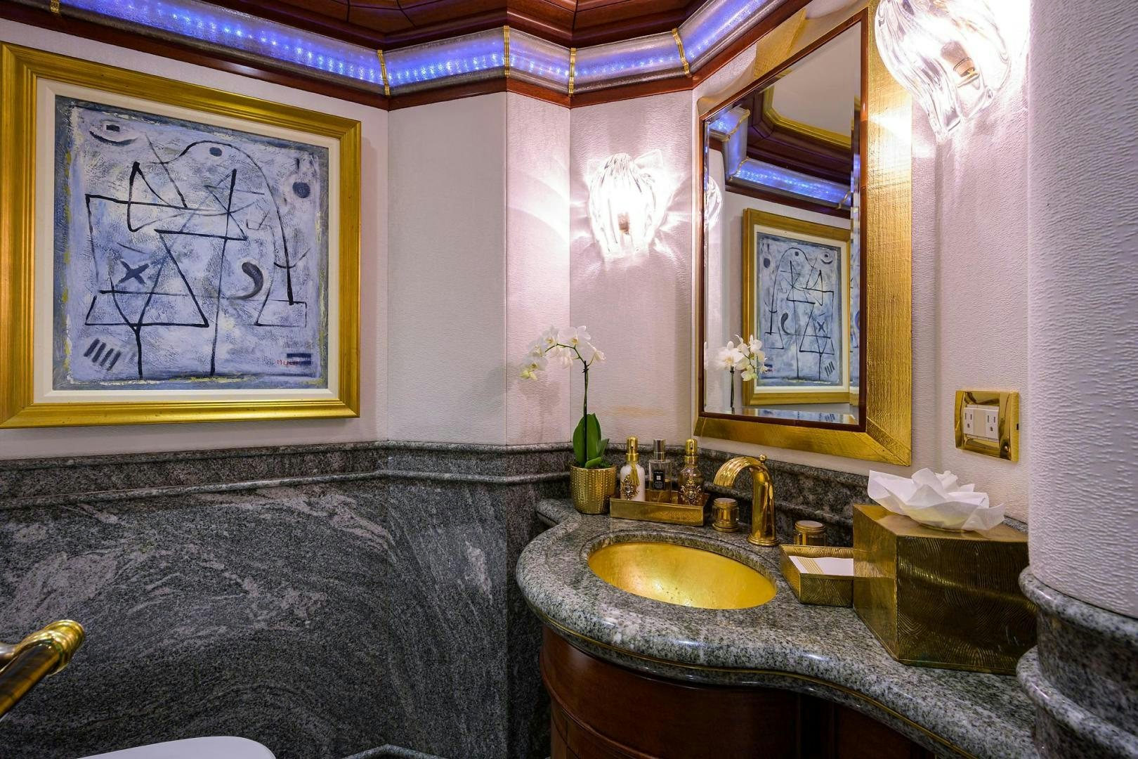 a bathroom with a sink and a mirror aboard STARSHIP Yacht for Sale