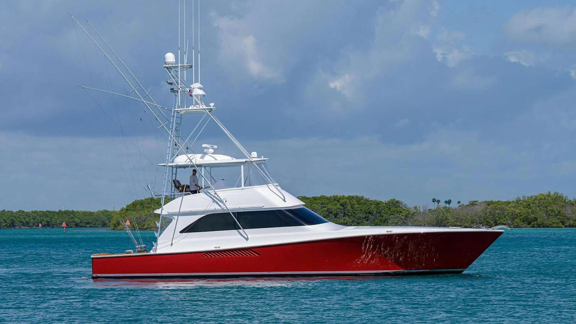 a red boat in the water aboard VALENTINE RESERVED Yacht for Sale