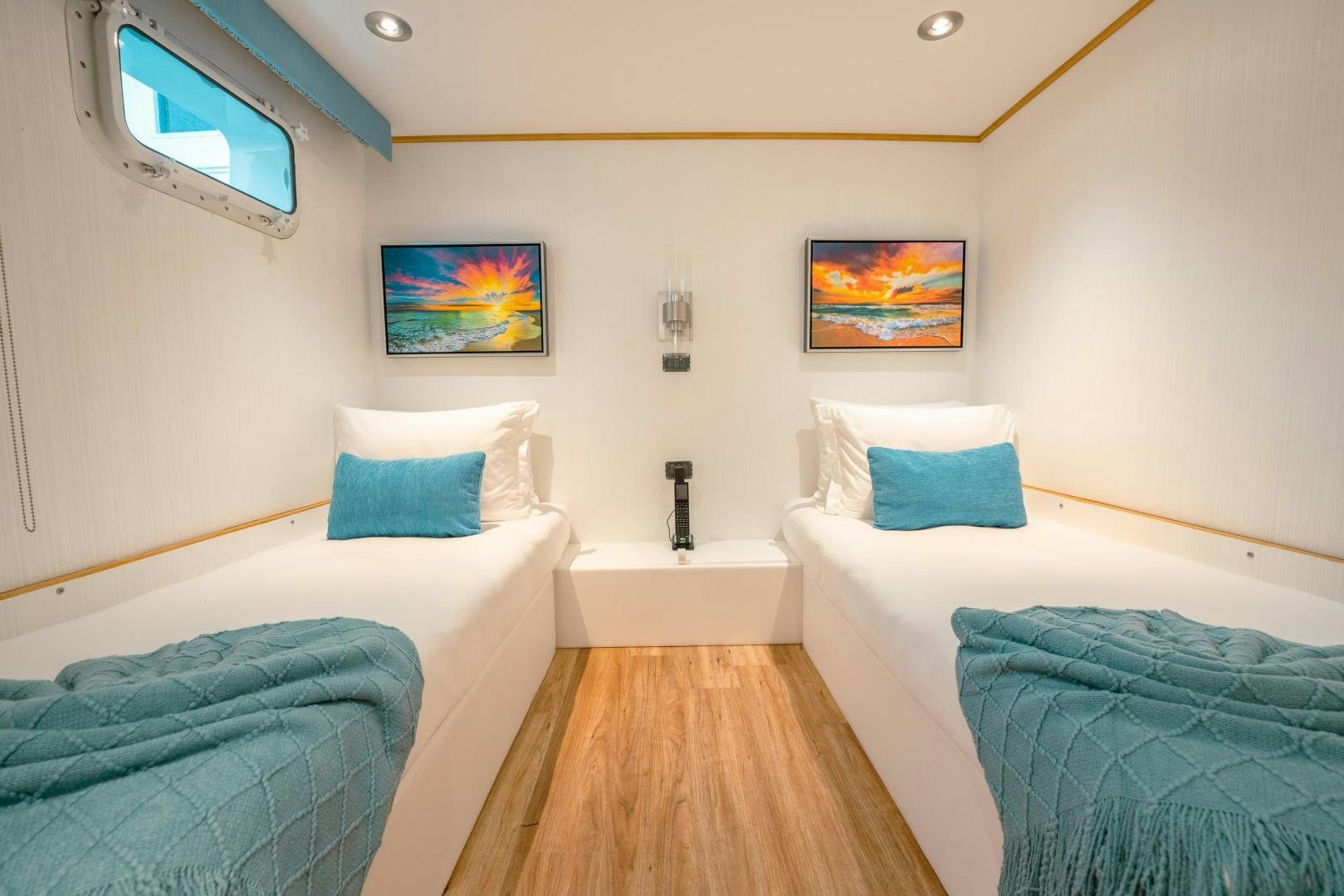 a couple of beds in a room aboard ALEXANDRA JANE Yacht for Sale