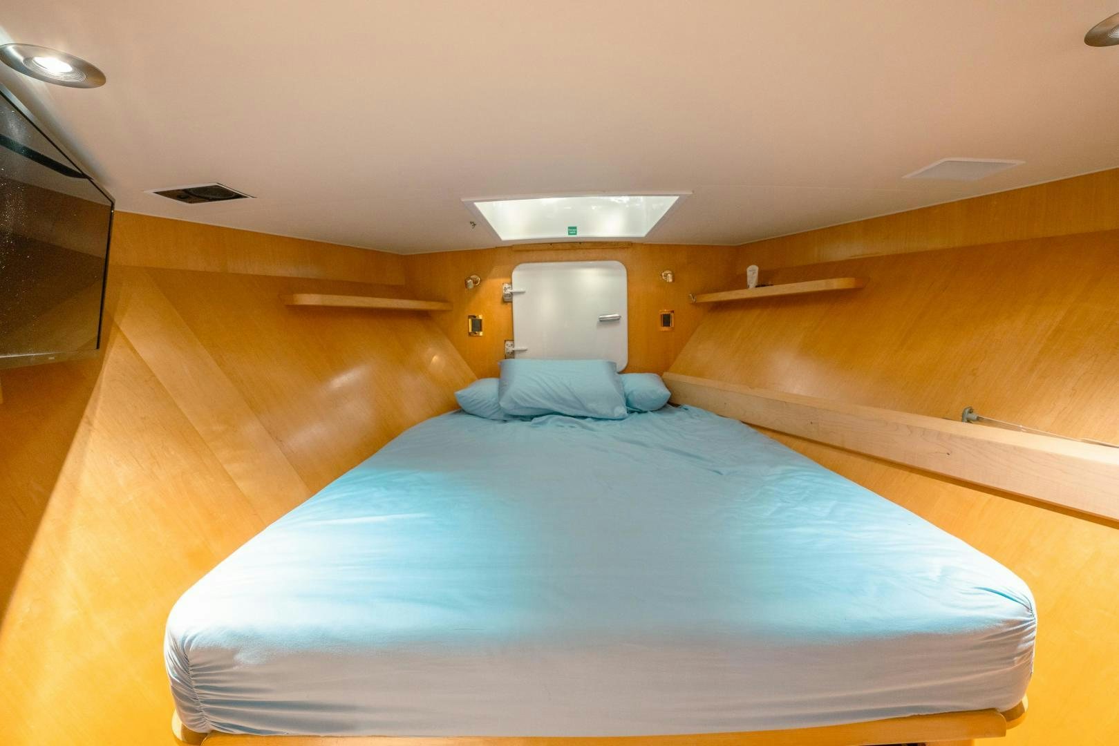 a bed in a room aboard ALEXANDRA JANE Yacht for Sale