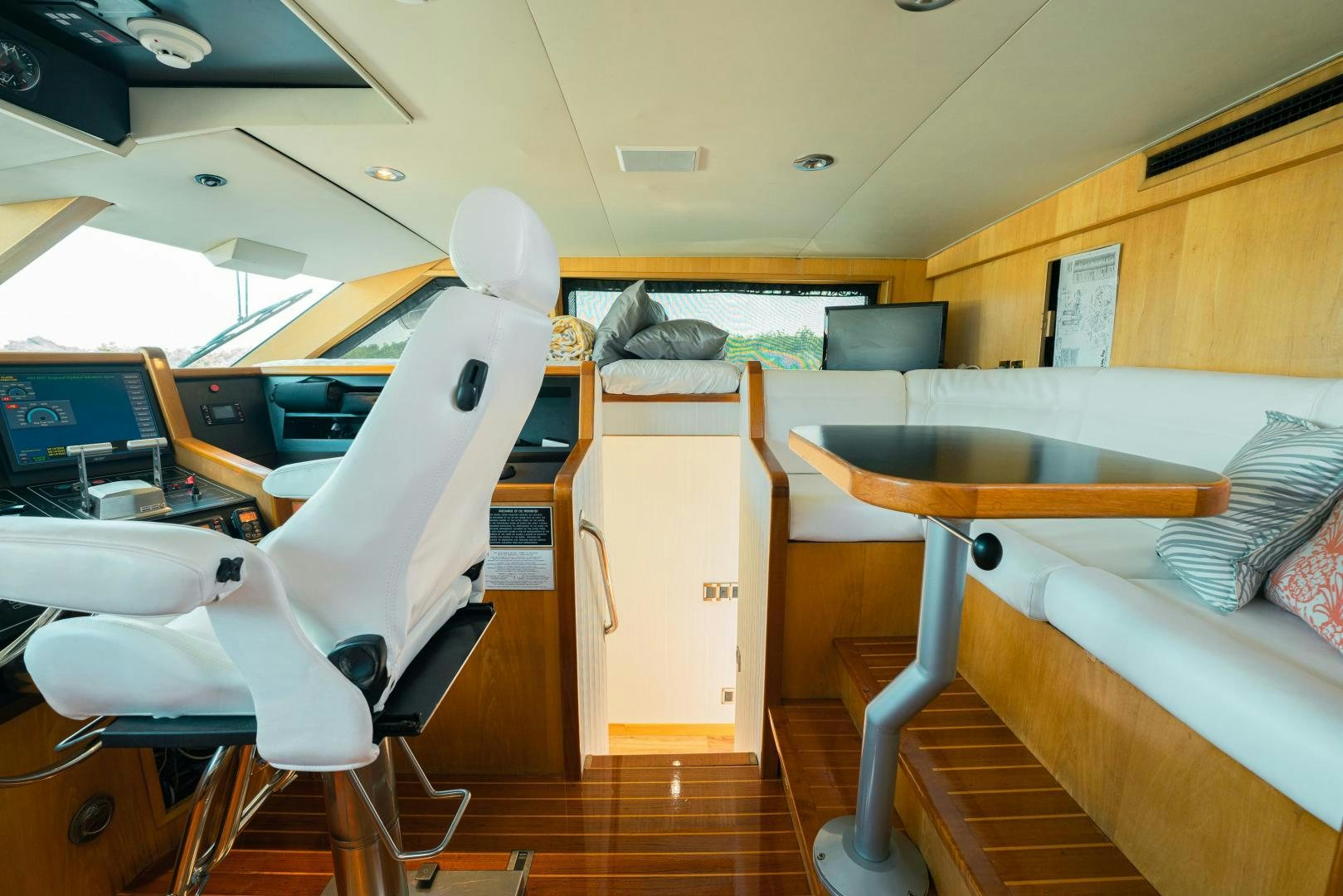 a room with bunk beds and a desk aboard ALEXANDRA JANE Yacht for Sale