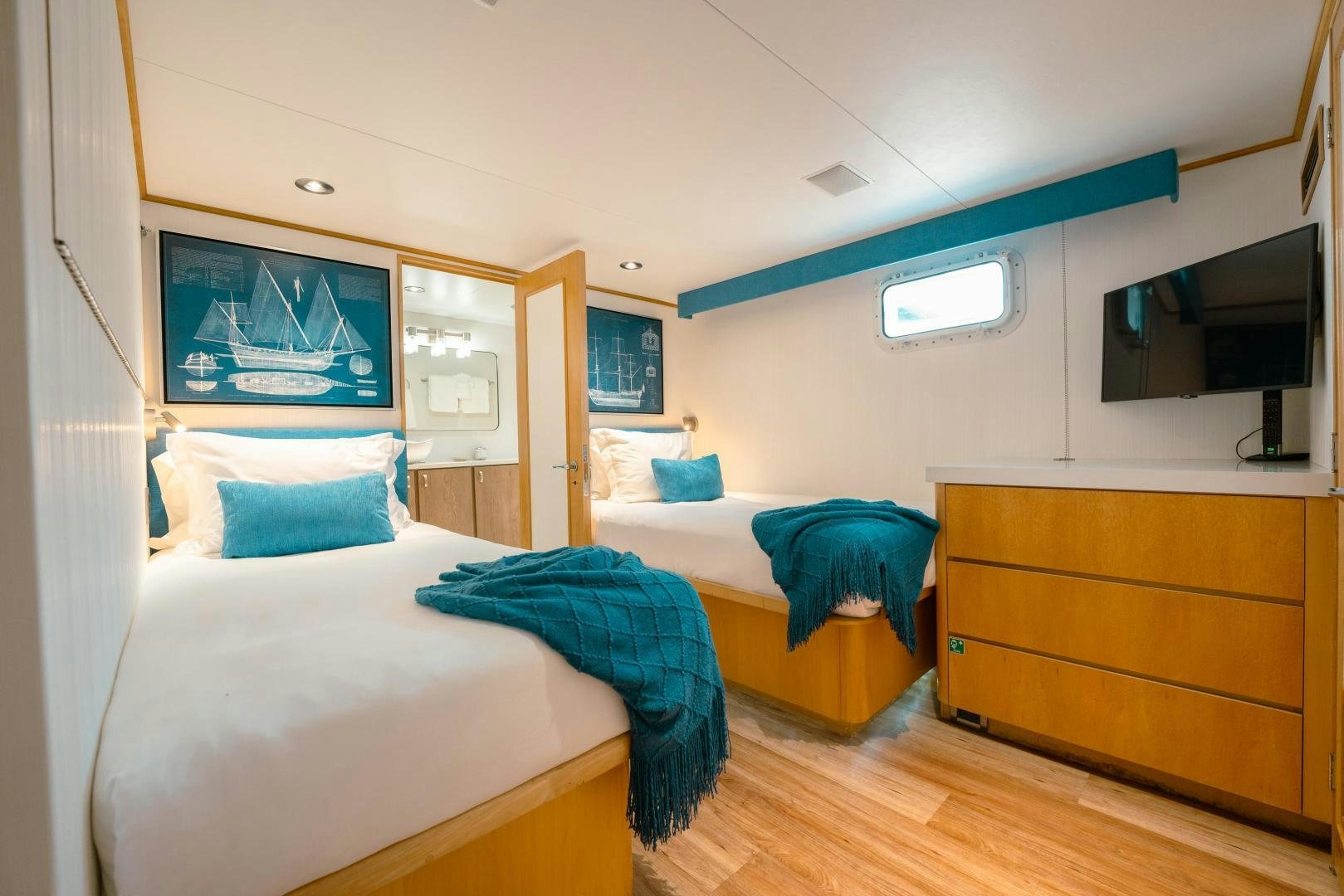 a room with two beds aboard ALEXANDRA JANE Yacht for Sale