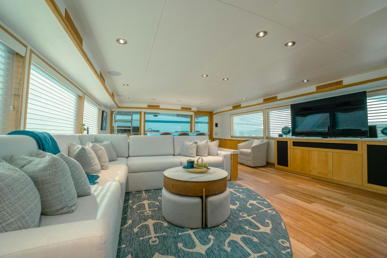 a living room with a large window aboard ALEXANDRA JANE Yacht for Sale