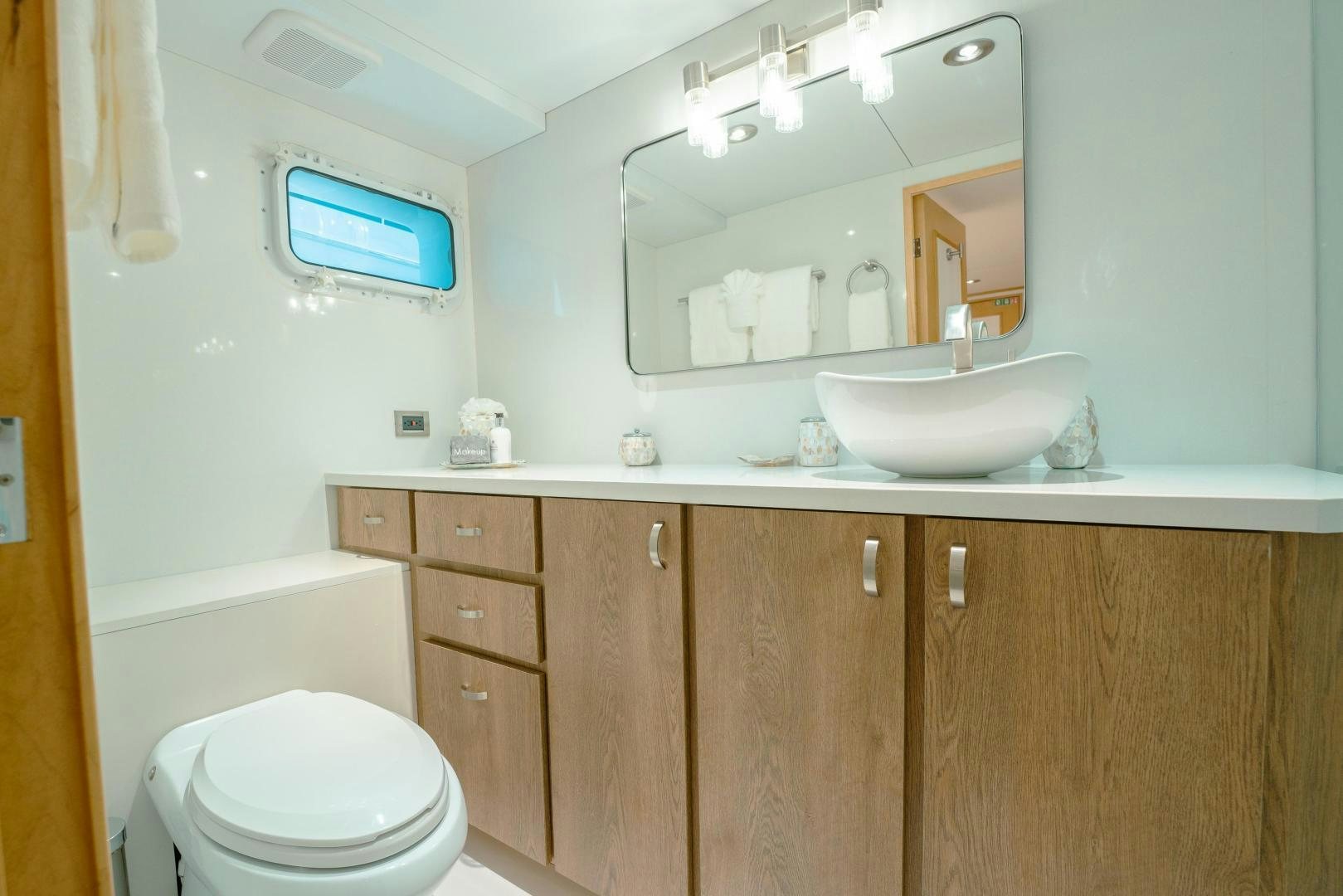 a bathroom with a sink and a toilet aboard ALEXANDRA JANE Yacht for Sale