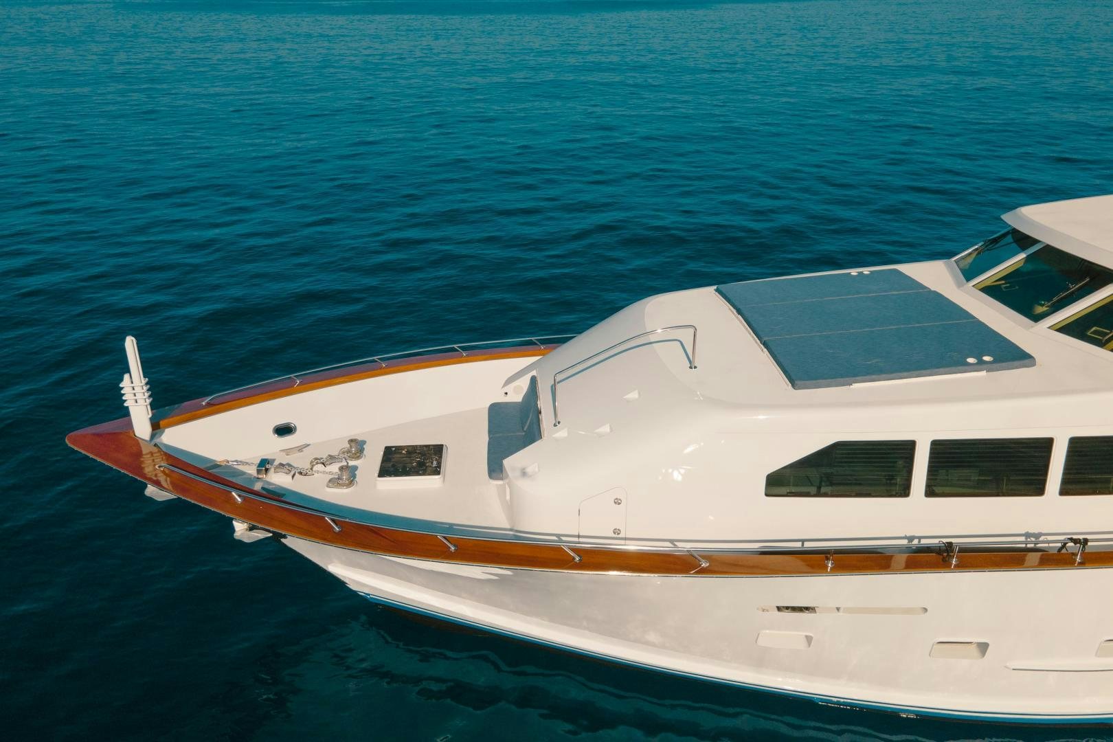 a white yacht in the water aboard ALEXANDRA JANE Yacht for Sale