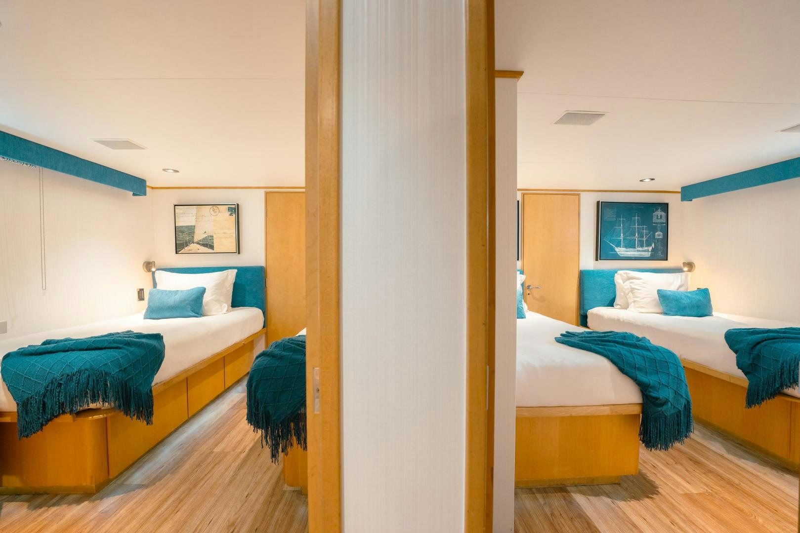 a room with two beds aboard ALEXANDRA JANE Yacht for Sale