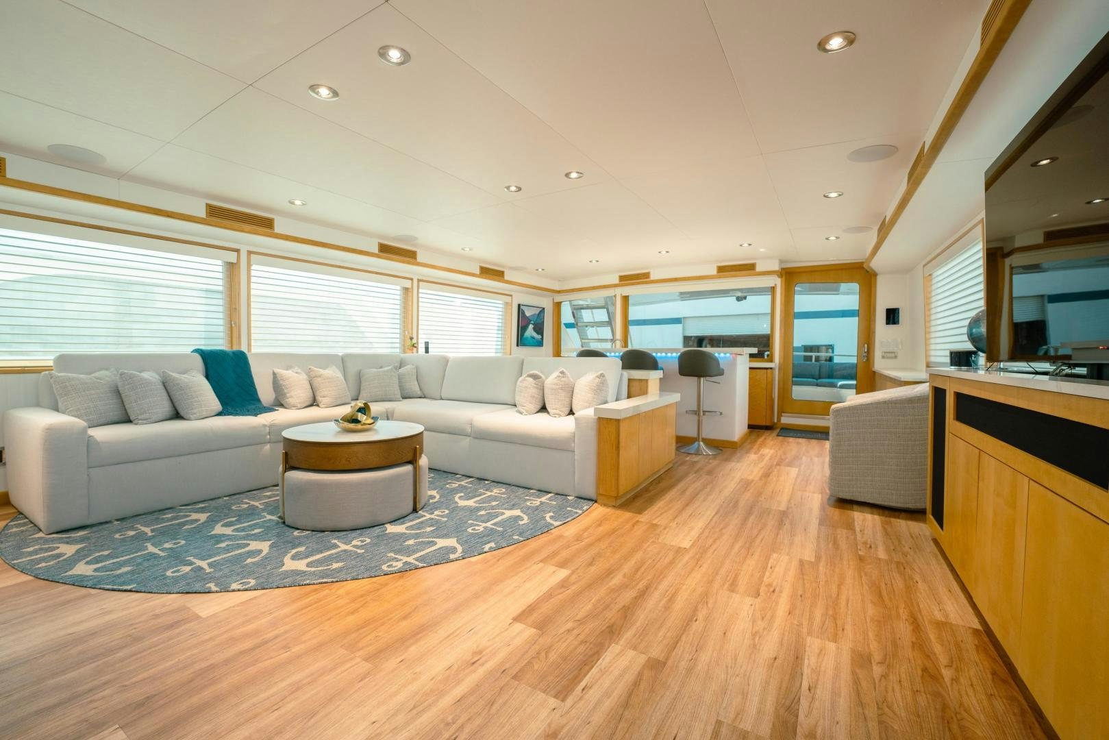 a living room with a couch and a table aboard ALEXANDRA JANE Yacht for Sale