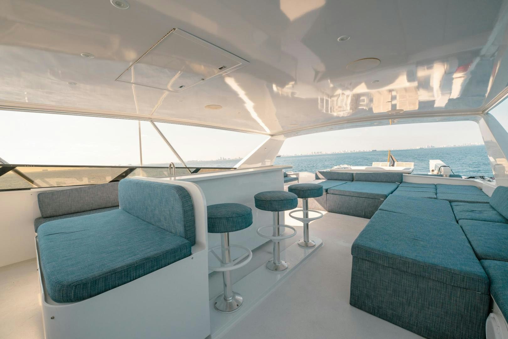 a boat with chairs and tables aboard ALEXANDRA JANE Yacht for Sale