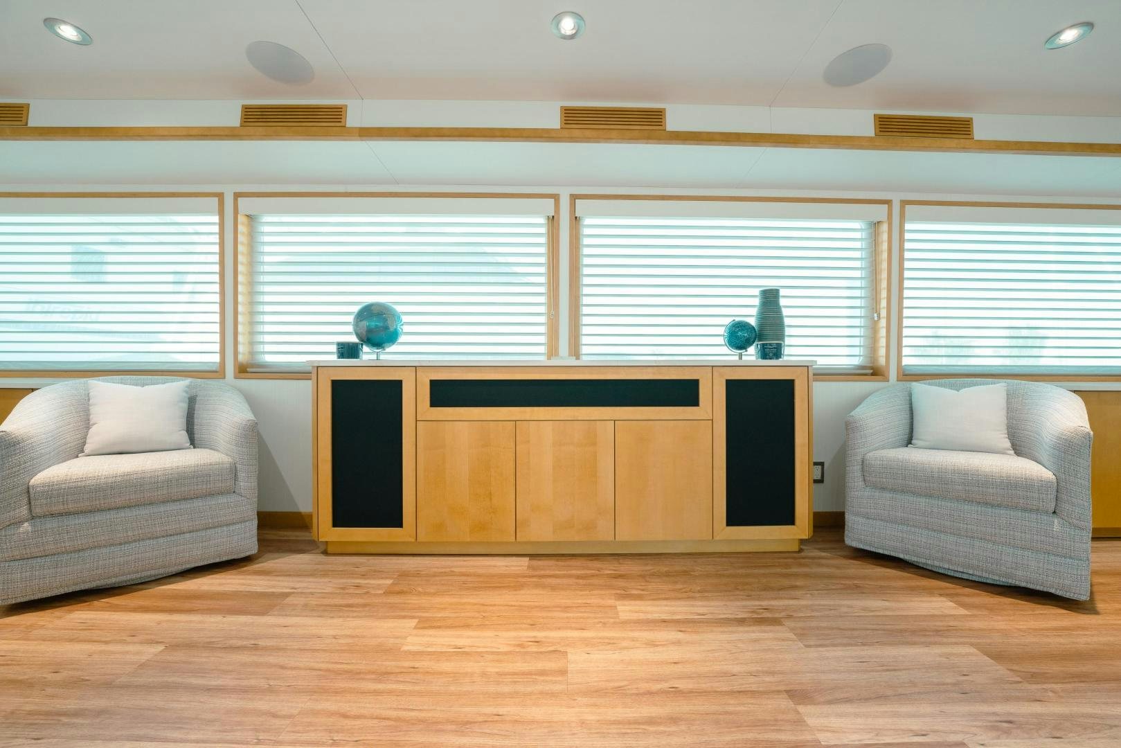 a room with a couch and a television aboard ALEXANDRA JANE Yacht for Sale