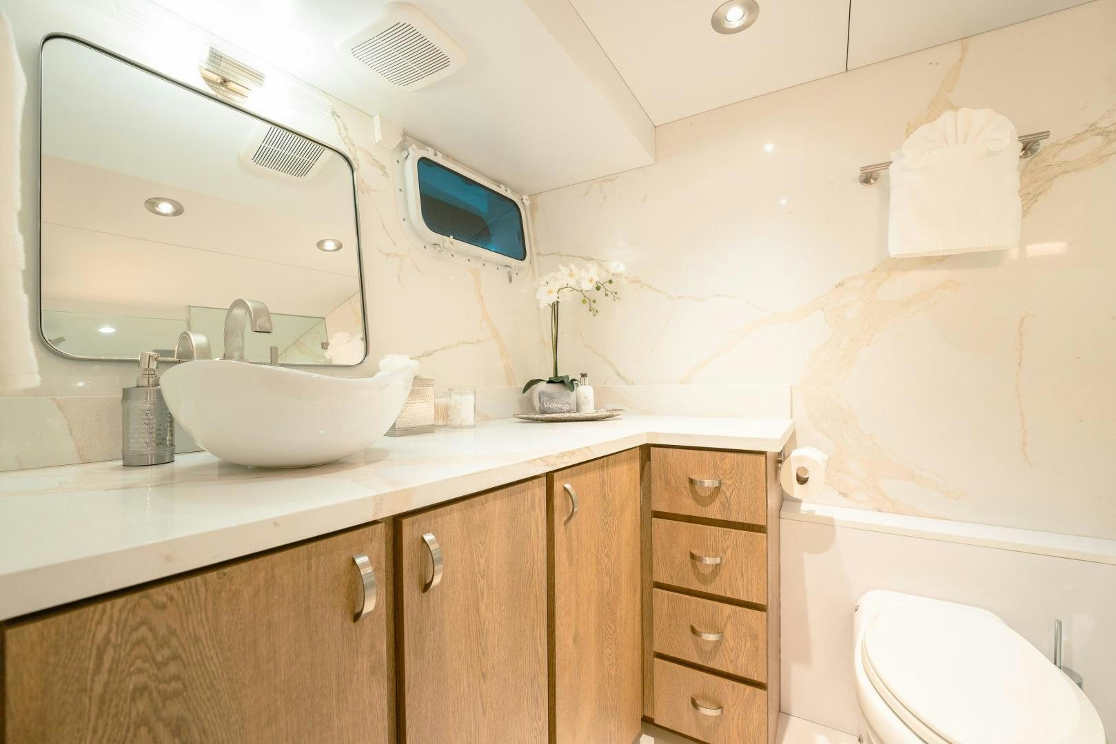 a bathroom with a sink and a toilet aboard ALEXANDRA JANE Yacht for Sale