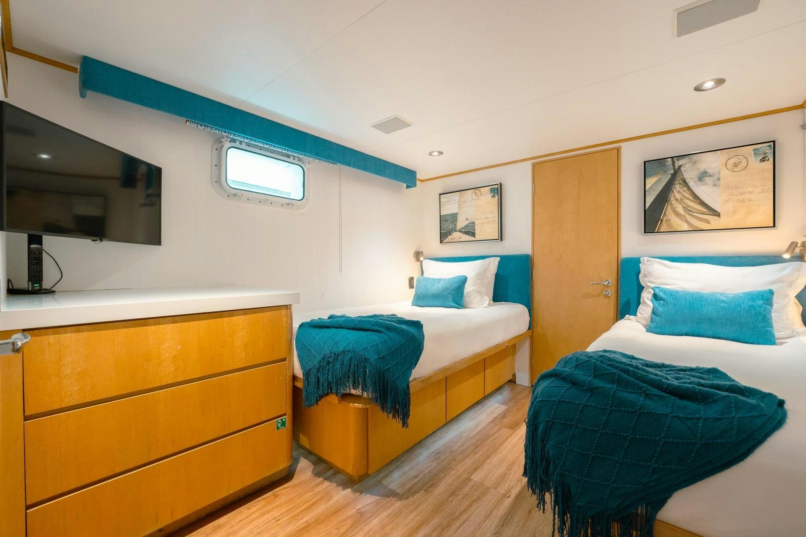 a couple of beds in a room aboard ALEXANDRA JANE Yacht for Sale