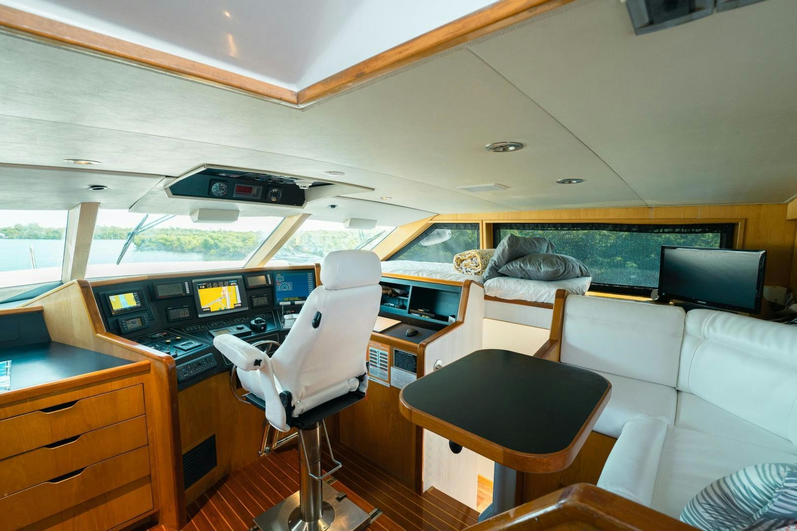 a room with a desk and a bed aboard ALEXANDRA JANE Yacht for Sale