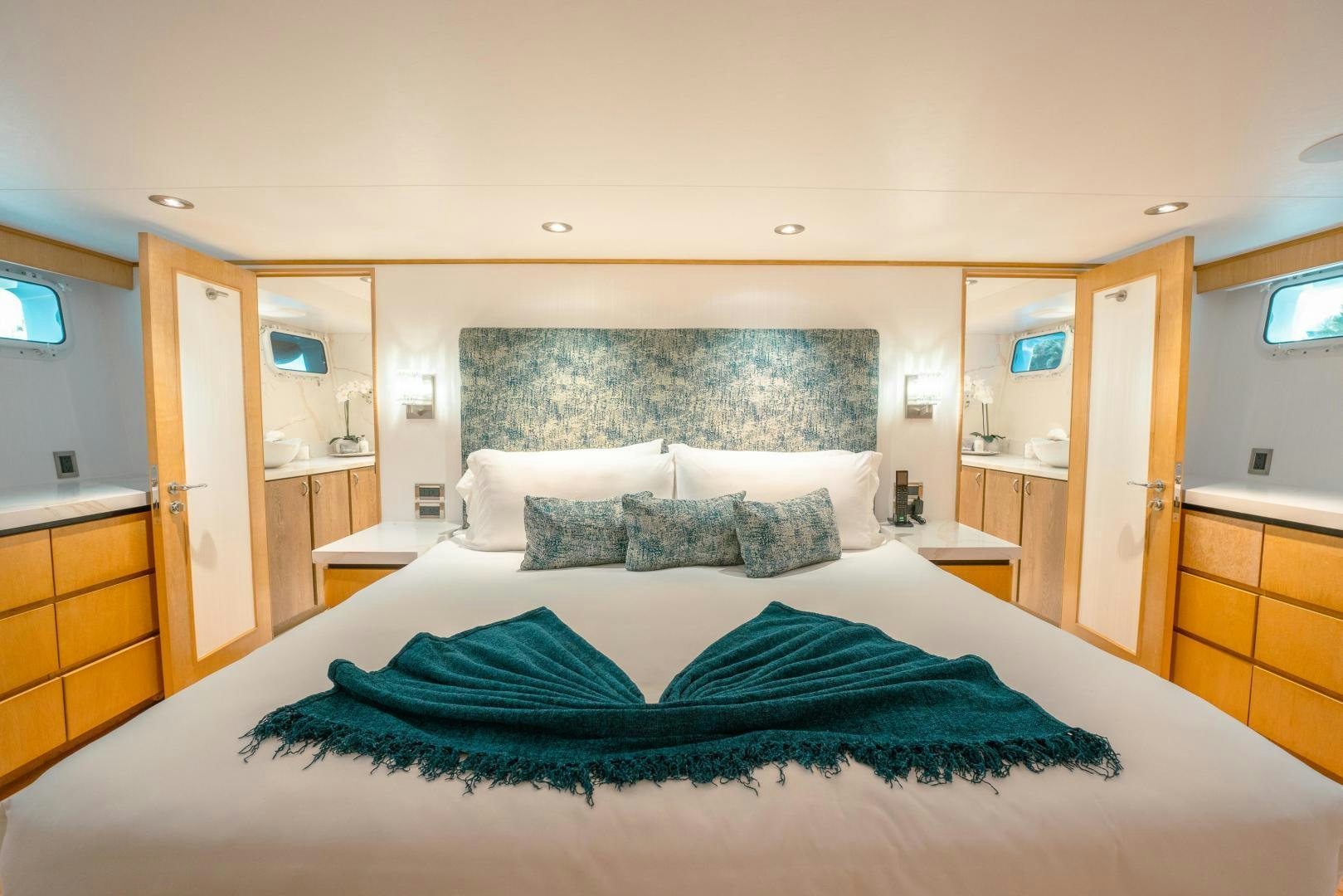 a bed in a room aboard ALEXANDRA JANE Yacht for Sale