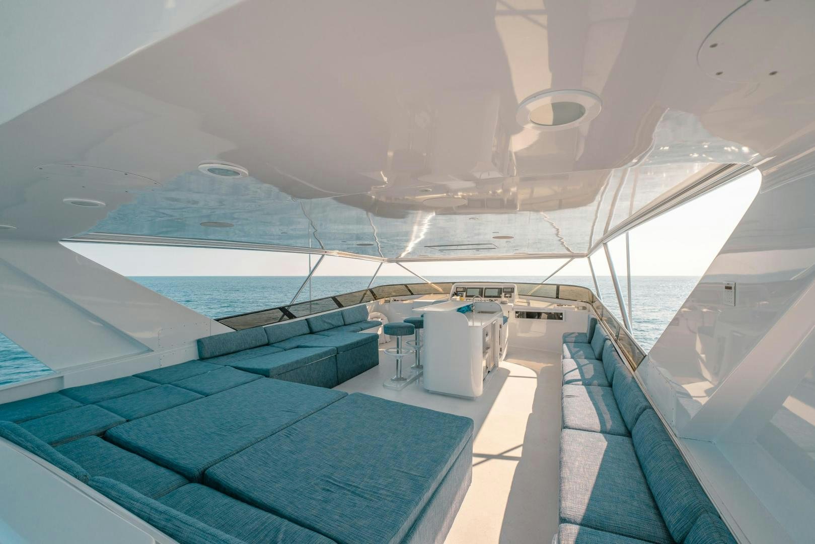 an airplane wing with a view of the water below aboard ALEXANDRA JANE Yacht for Sale