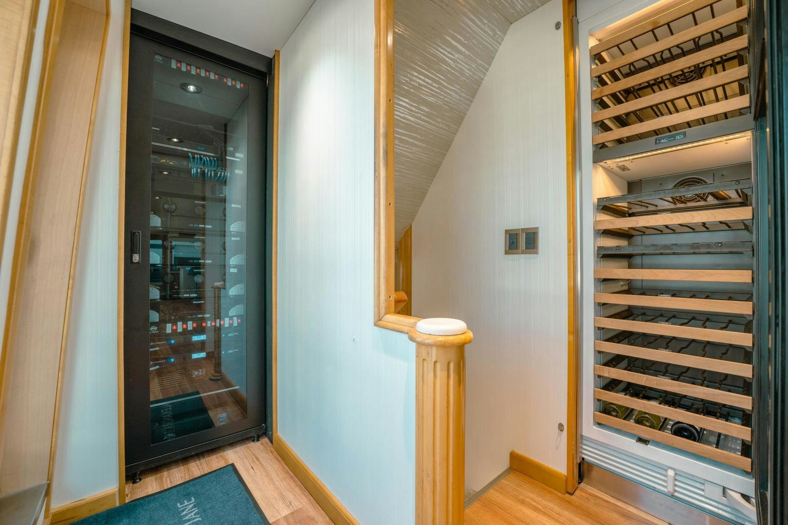 a room with a door and a staircase aboard ALEXANDRA JANE Yacht for Sale