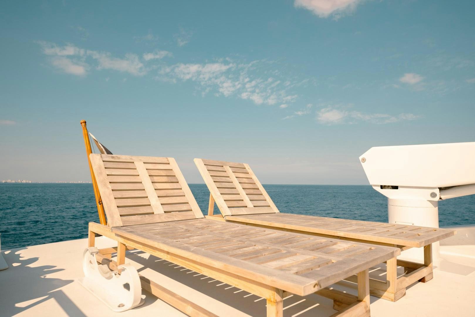 a couple of chairs on a dock aboard ALEXANDRA JANE Yacht for Sale
