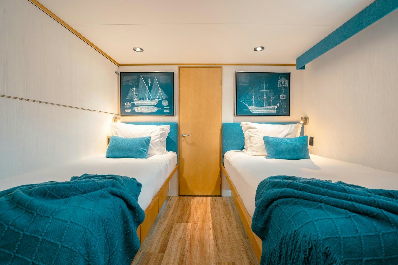 a couple of beds in a room aboard ALEXANDRA JANE Yacht for Sale