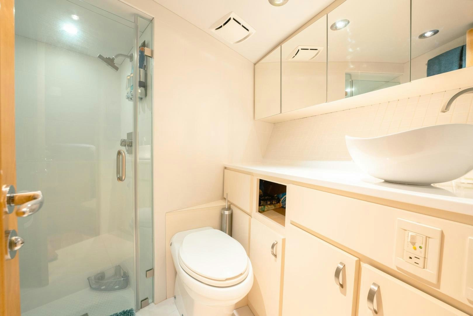 a bathroom with a glass shower aboard ALEXANDRA JANE Yacht for Sale