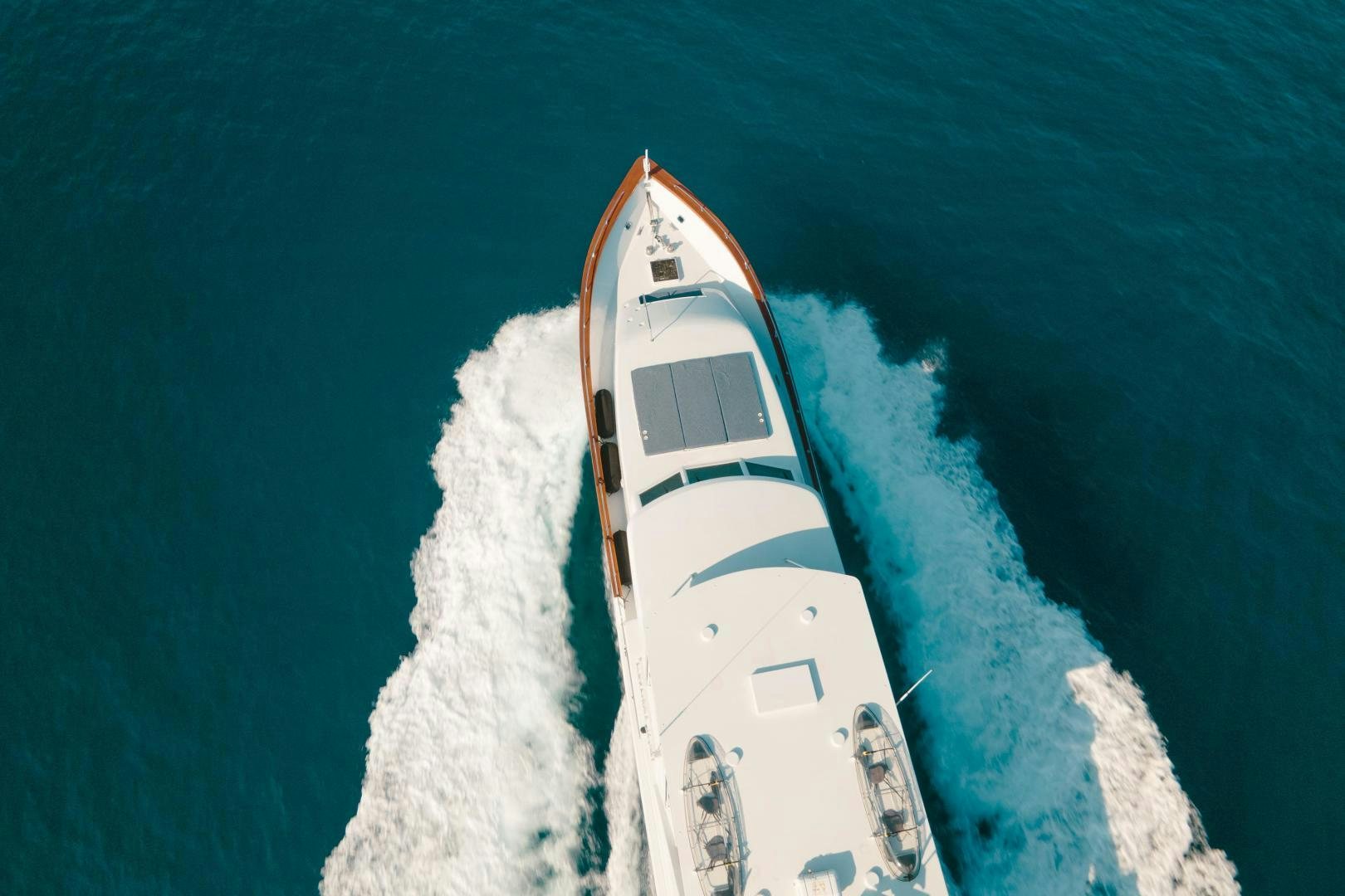 a white boat in the water aboard ALEXANDRA JANE Yacht for Sale
