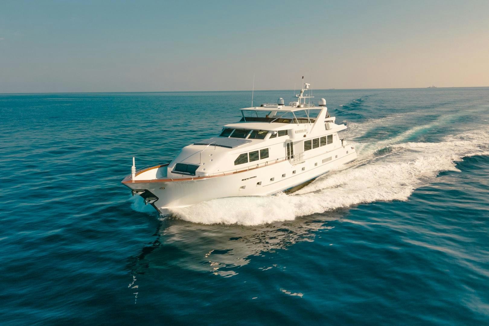 a white yacht on the water aboard ALEXANDRA JANE Yacht for Sale