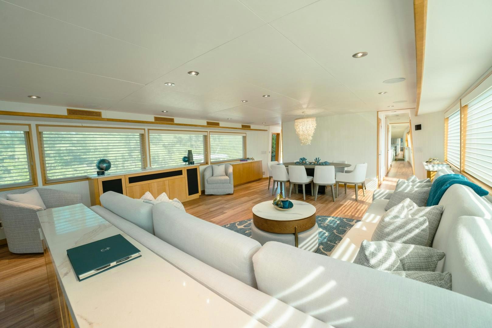 a living room with a couch and a laptop aboard ALEXANDRA JANE Yacht for Sale