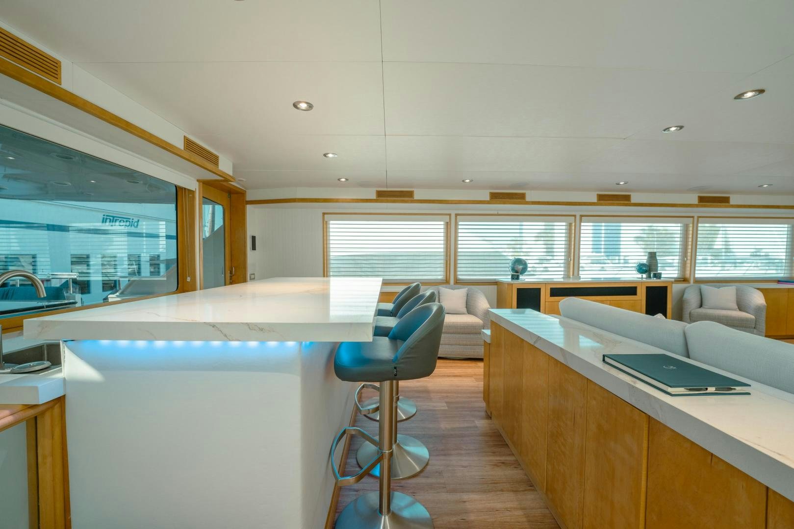 a room with a table and chairs aboard ALEXANDRA JANE Yacht for Sale