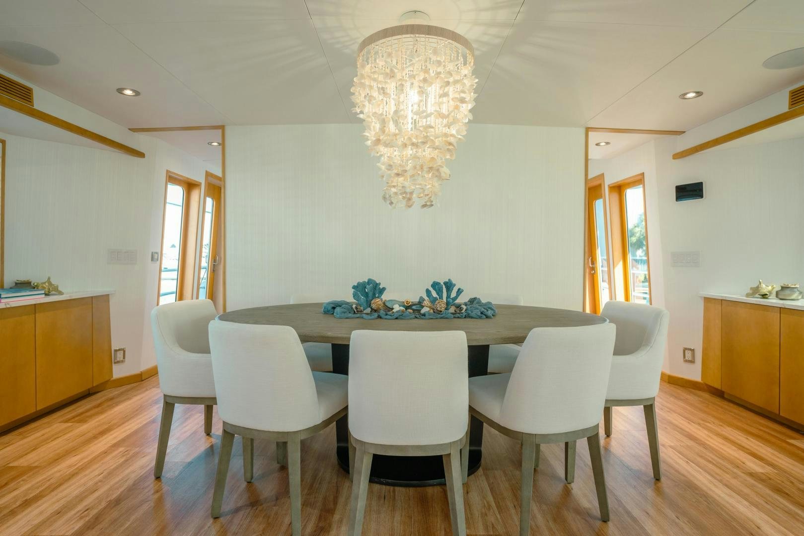 a dining room with a table and chairs aboard ALEXANDRA JANE Yacht for Sale