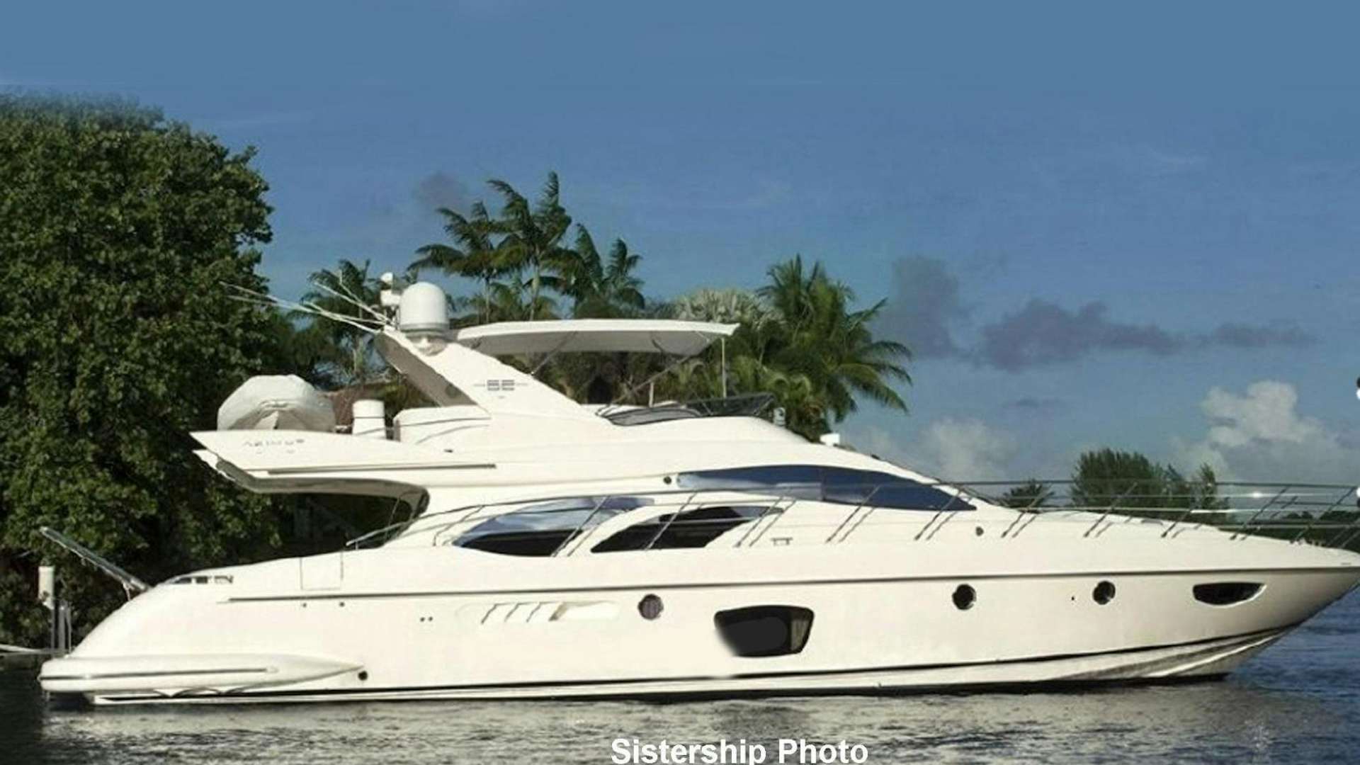 a white yacht on the water aboard SIMPLE TOY Yacht for Sale