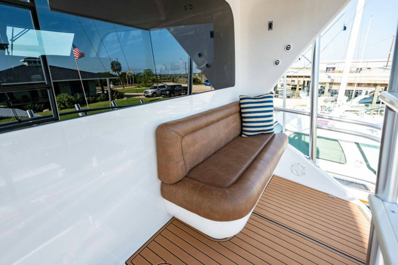 a brown boot on a wooden deck aboard Bimini Babe Yacht for Sale