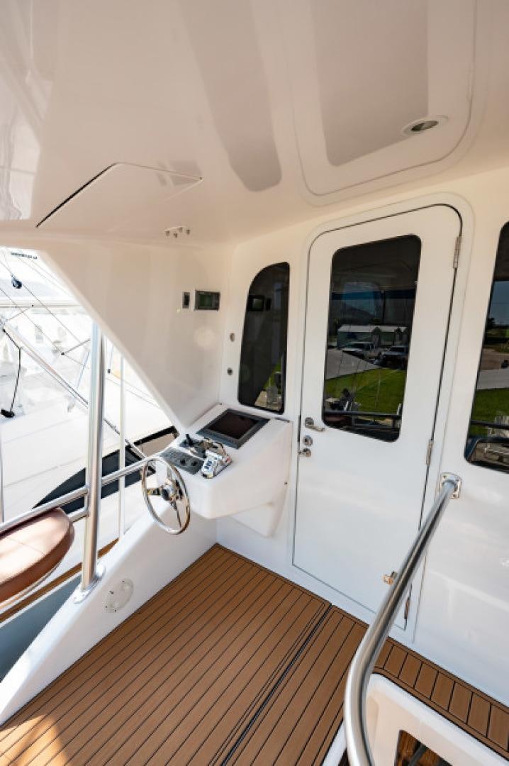 inside of a white vehicle aboard Bimini Babe Yacht for Sale