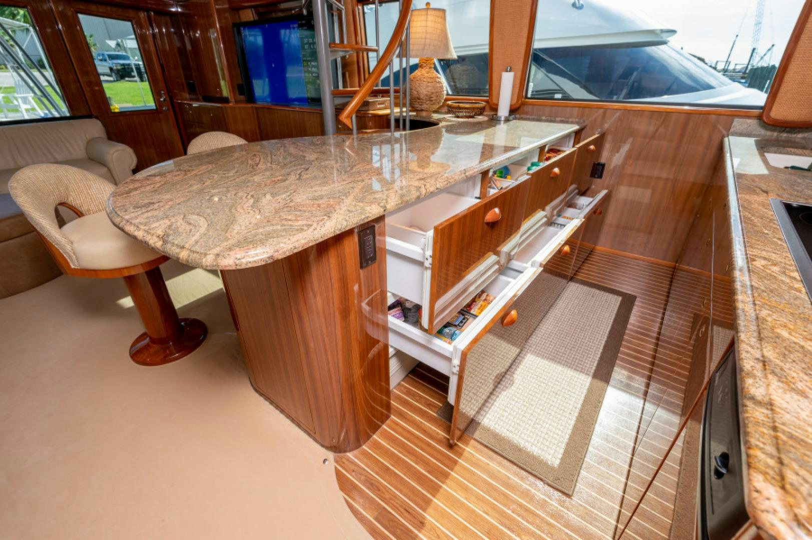 a table with a glass top aboard Bimini Babe Yacht for Sale