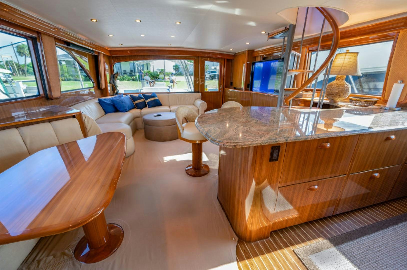a room with a large mirror and a couch aboard Bimini Babe Yacht for Sale