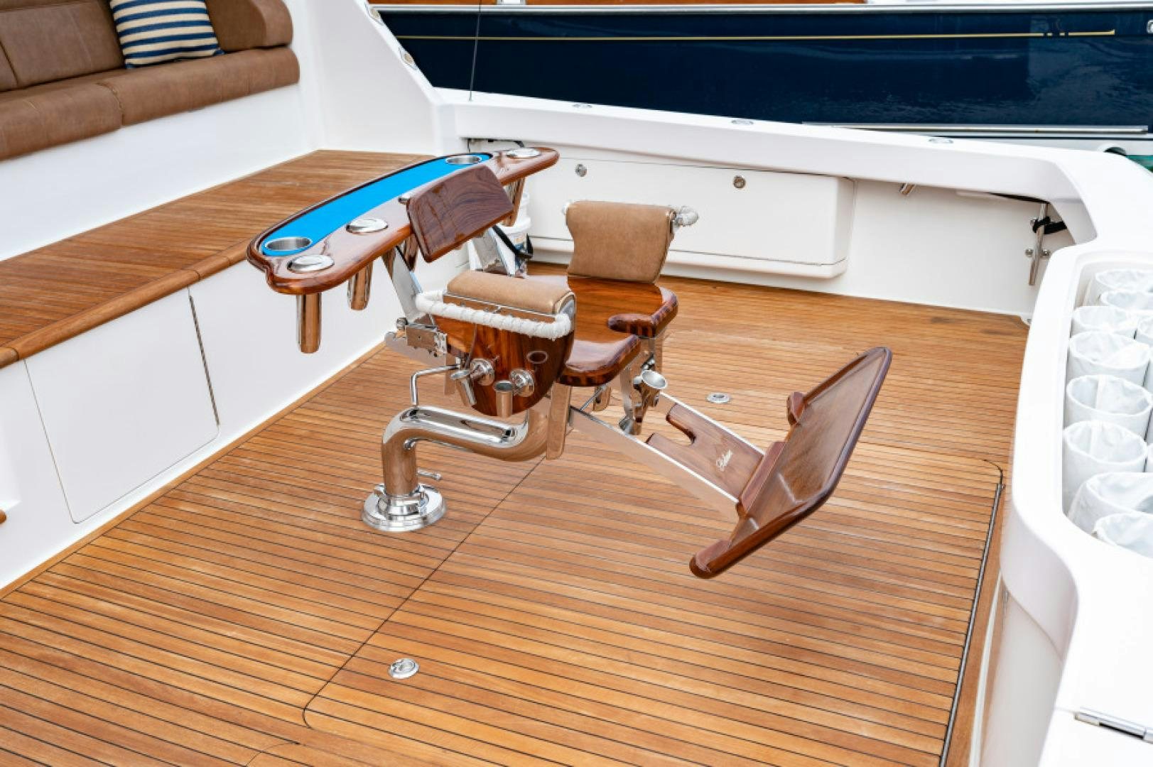 a table with chairs on it aboard Bimini Babe Yacht for Sale