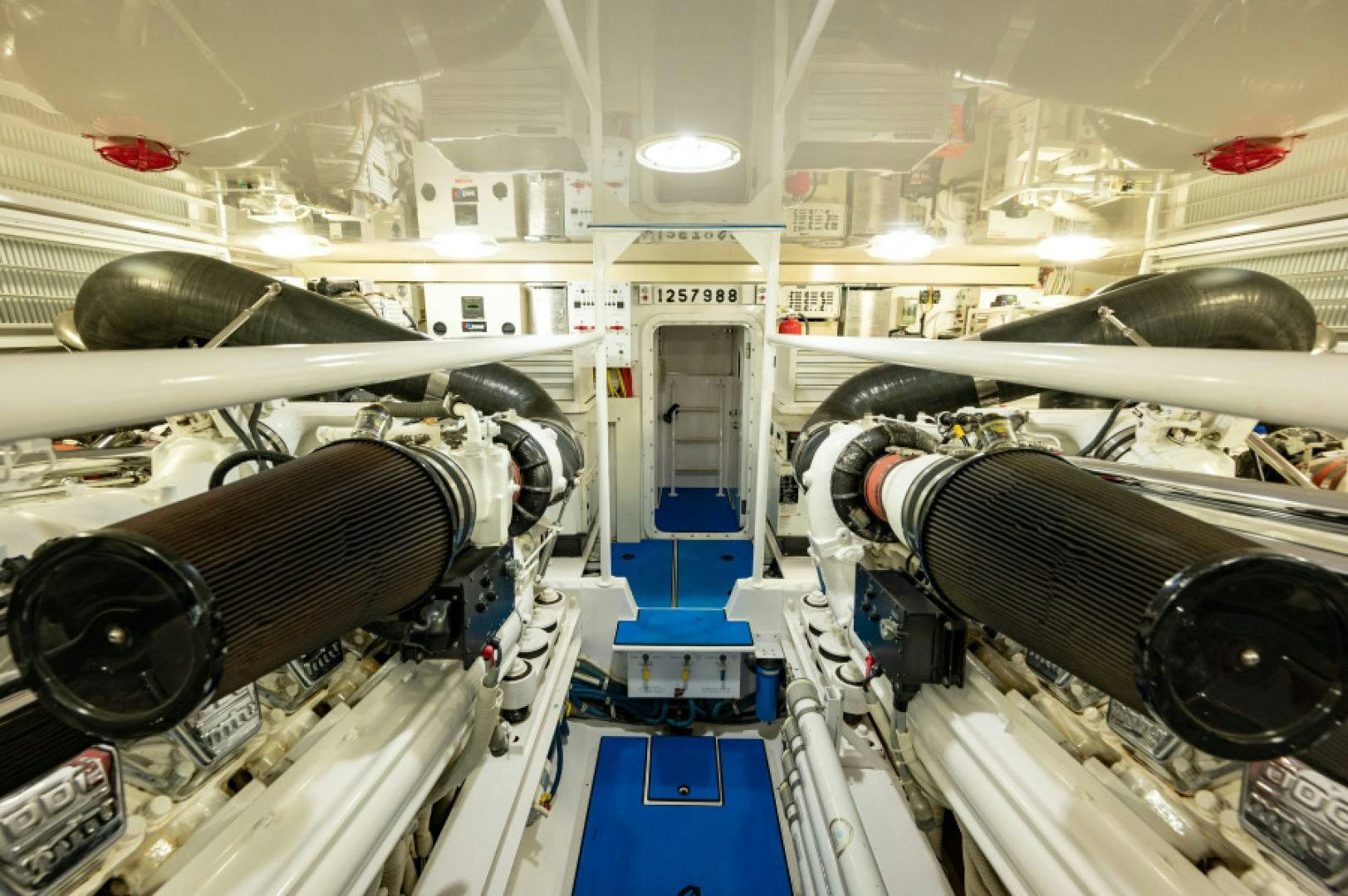 a room with machinery and pipes aboard Bimini Babe Yacht for Sale