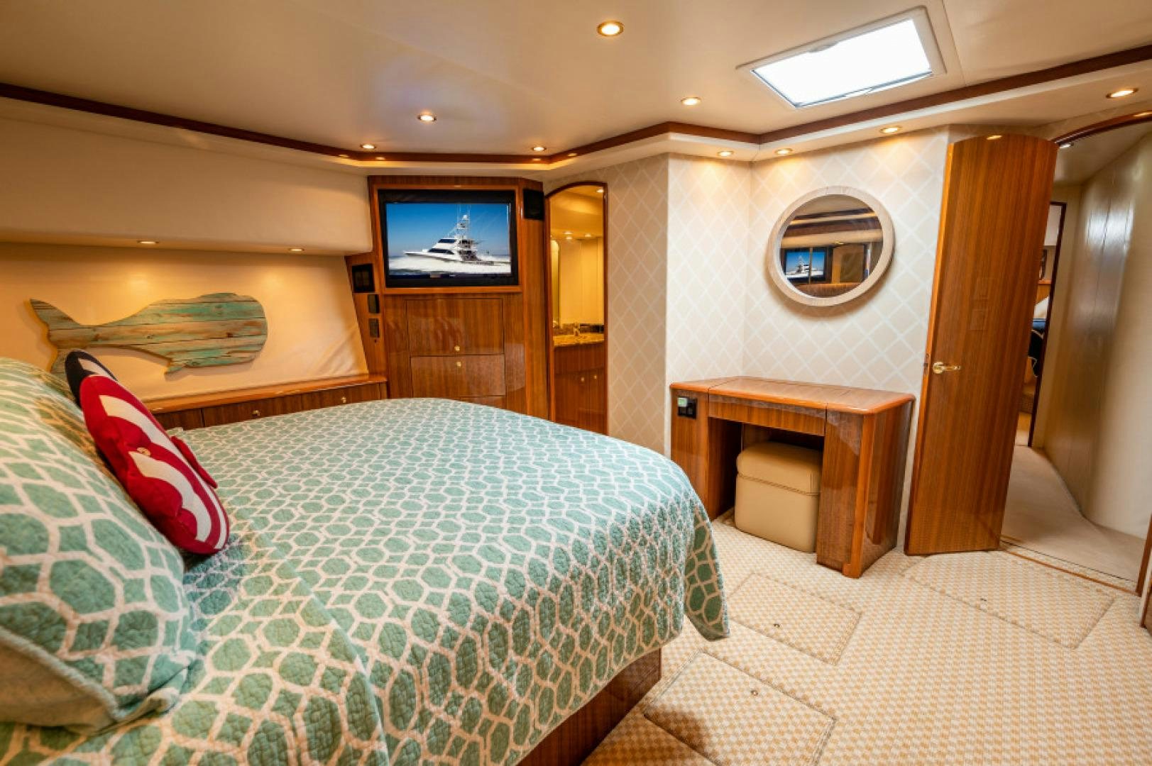 a bed in a room aboard Bimini Babe Yacht for Sale