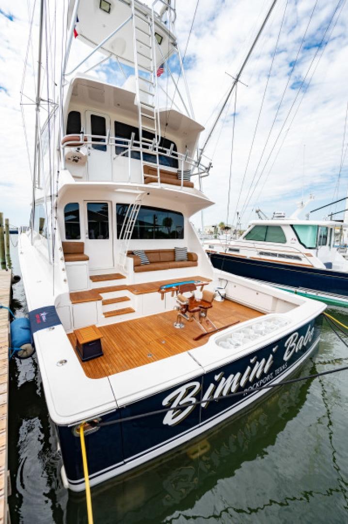 a couple of boats sit in a harbor aboard Bimini Babe Yacht for Sale
