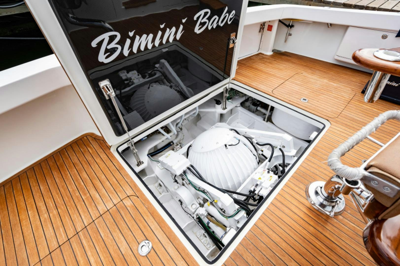 a white box with a picture of a cat inside aboard Bimini Babe Yacht for Sale