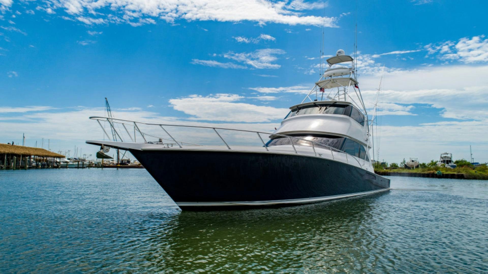 a large ship in the water aboard Bimini Babe Yacht for Sale