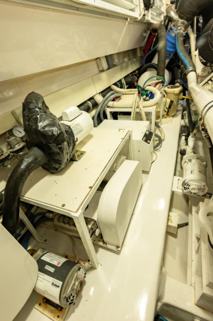 a shoe on a toilet aboard Bimini Babe Yacht for Sale