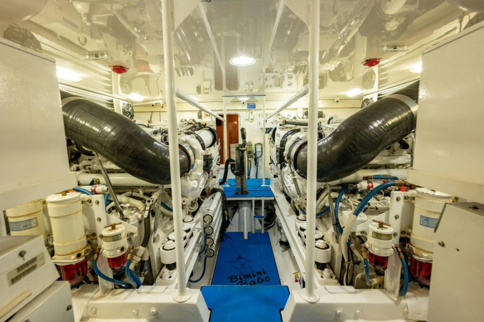 a factory with pipes and tubes aboard Bimini Babe Yacht for Sale