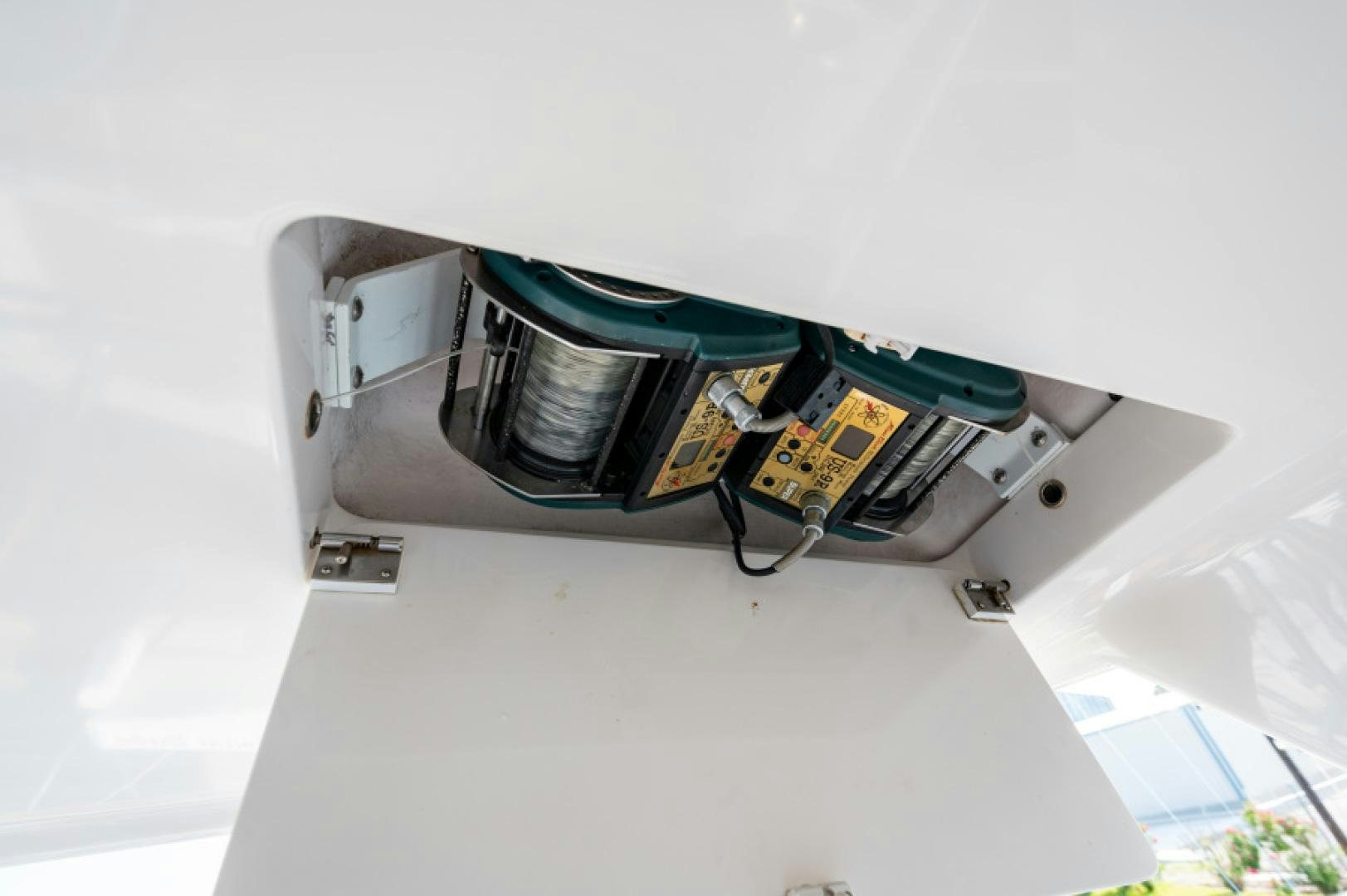 a green and black object aboard Bimini Babe Yacht for Sale