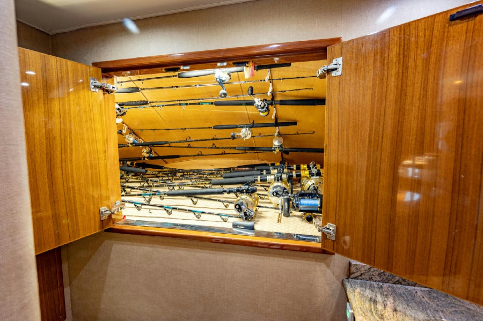 a room with a rack of boats aboard Bimini Babe Yacht for Sale