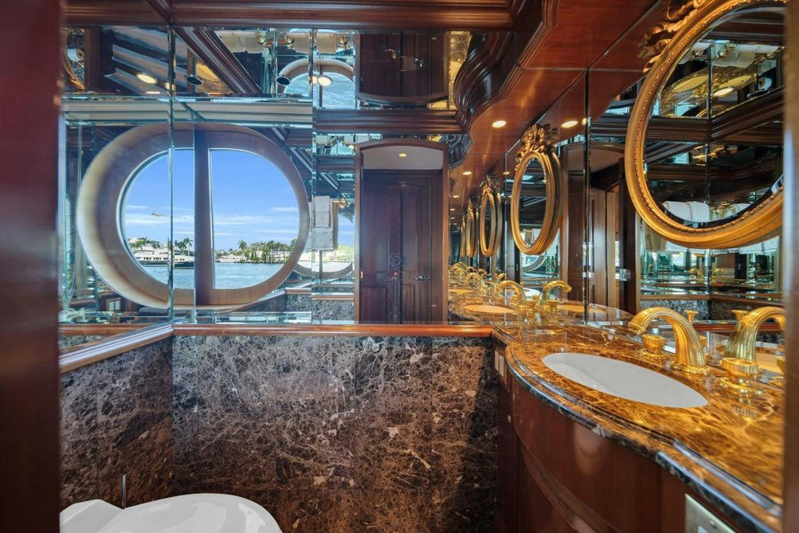 a bathroom with a marble counter aboard GRANDEUR Yacht for Sale
