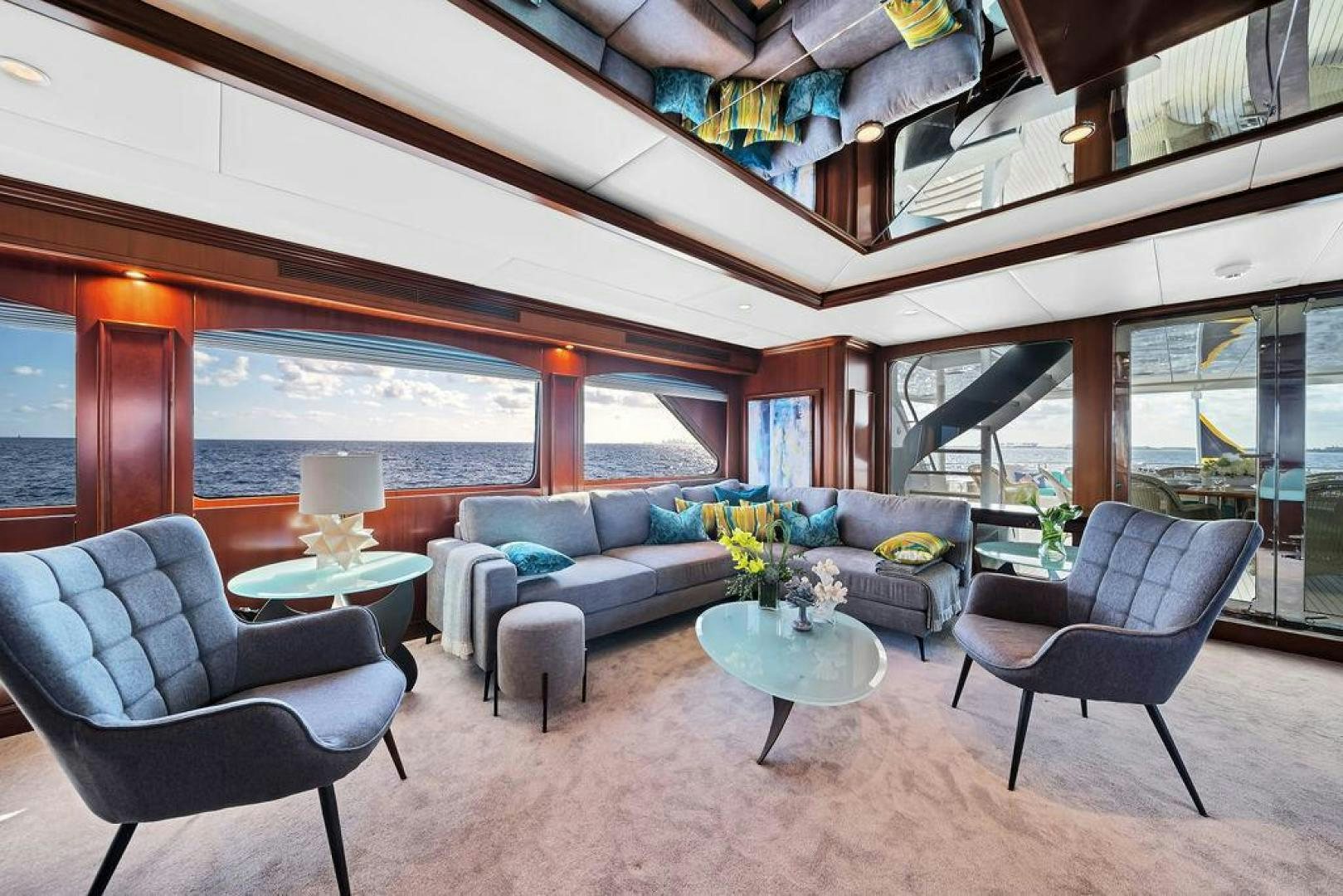 a living room with a large window aboard GRANDEUR Yacht for Sale