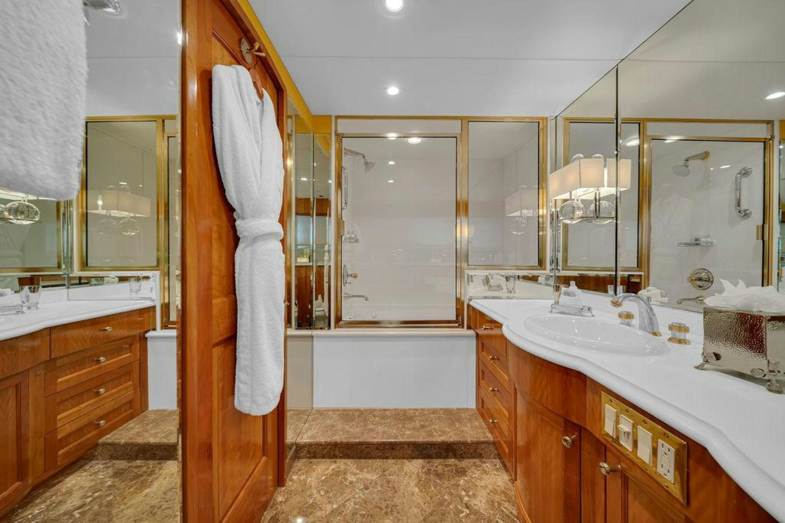 a bathroom with a large tub aboard GRANDEUR Yacht for Sale