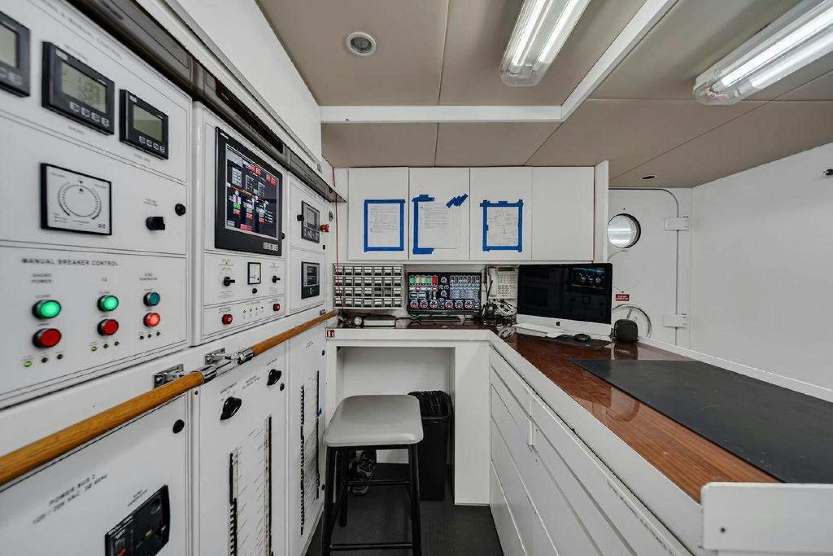 a room with a desk and computer aboard GRANDEUR Yacht for Sale