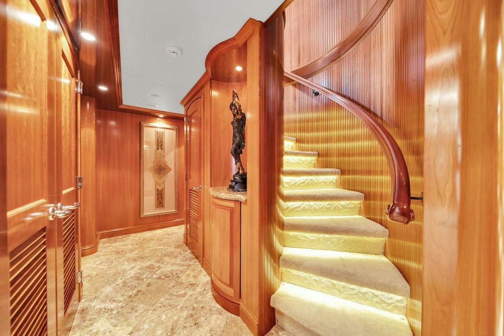 a staircase in a house aboard GRANDEUR Yacht for Sale