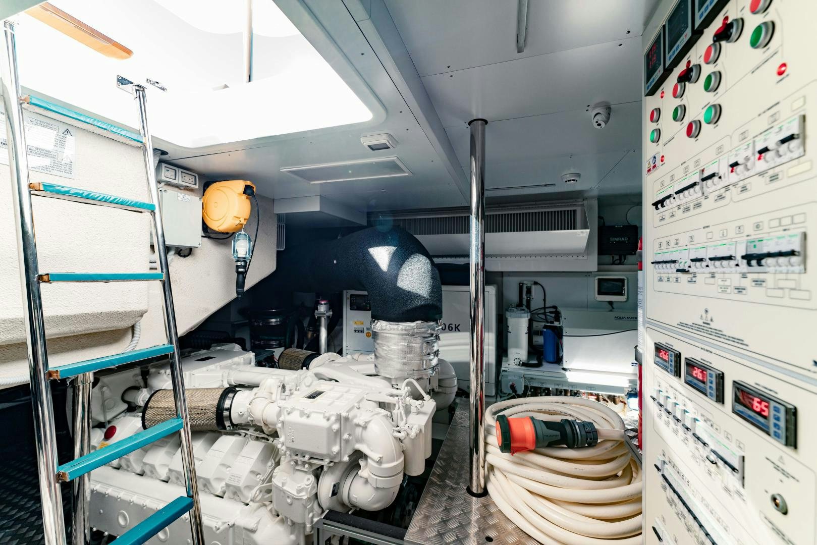 a machine in a room aboard BESO Yacht for Sale